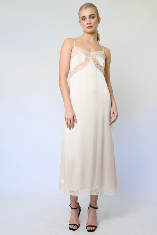 women’s silk satin slip dress with lace trim, spaghetti straps and peep-through lace detail under the bust in soft pink, on sale